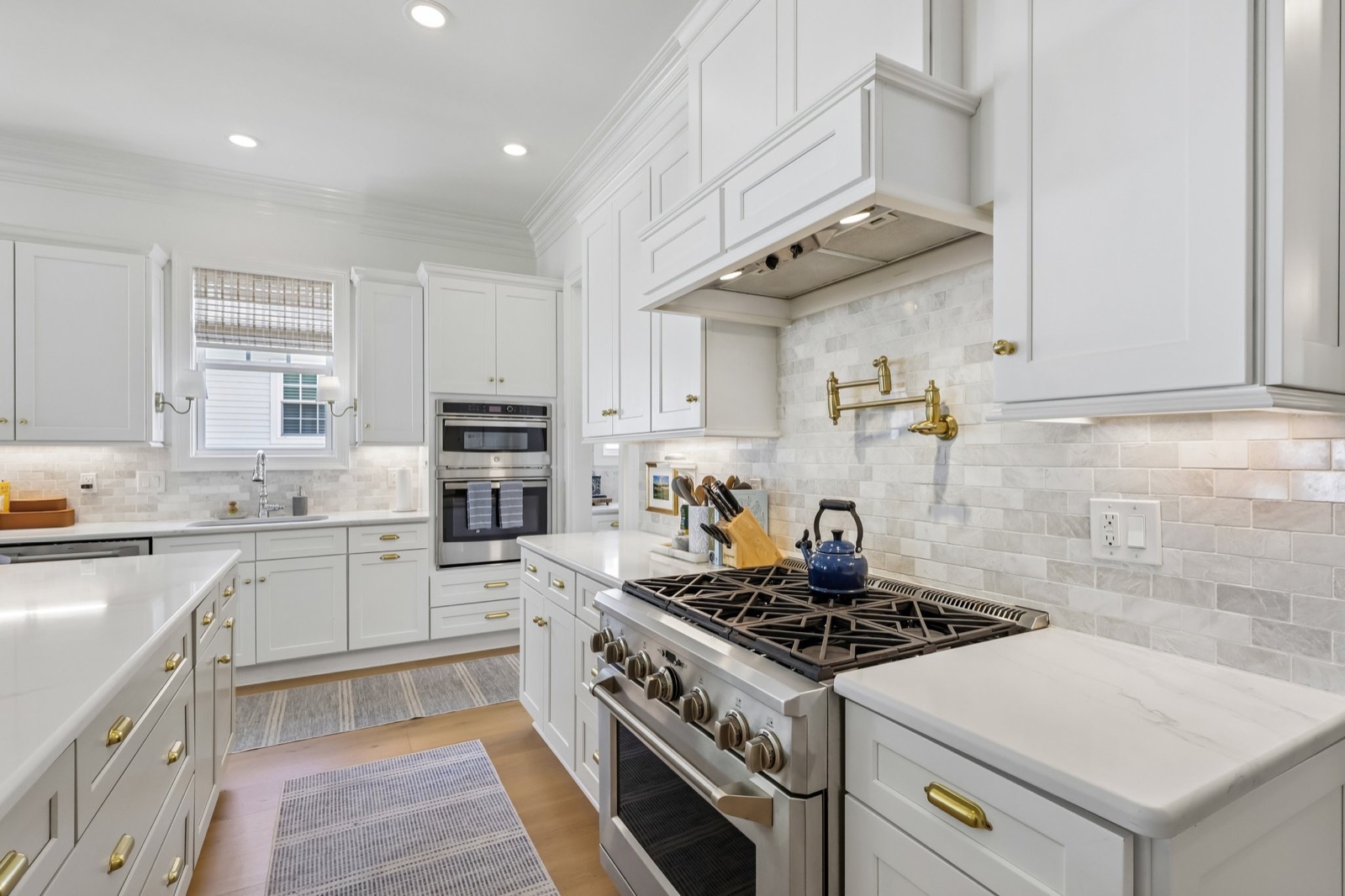Chef's kitchen with 36-inch gas range and pot filler